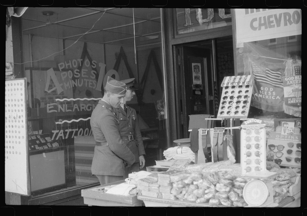 [Untitled photo, possibly related to: Window display in military supply store in Columbus, Georgia]. Sourced from the…