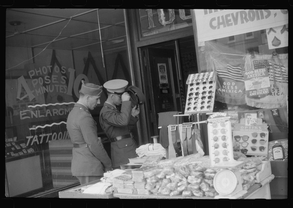 [Untitled photo, possibly related to: Window display in military supply store in Columbus, Georgia]. Sourced from the…