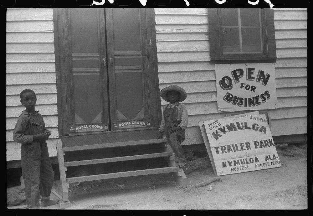  children outside a recently opened lunch room and trailer park in Kymulga near Childersburg, Alabama. Sourced from the…