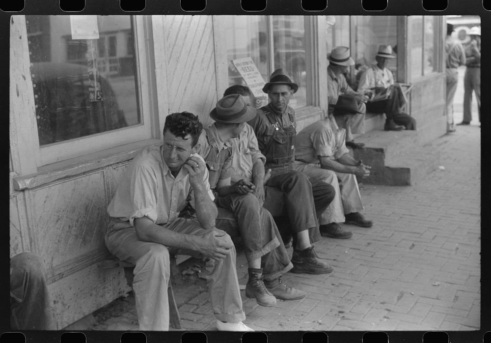 [Untitled photo, possibly related to: Workers, some of them unemployed, on the main street of Childersburg, Alabama].…