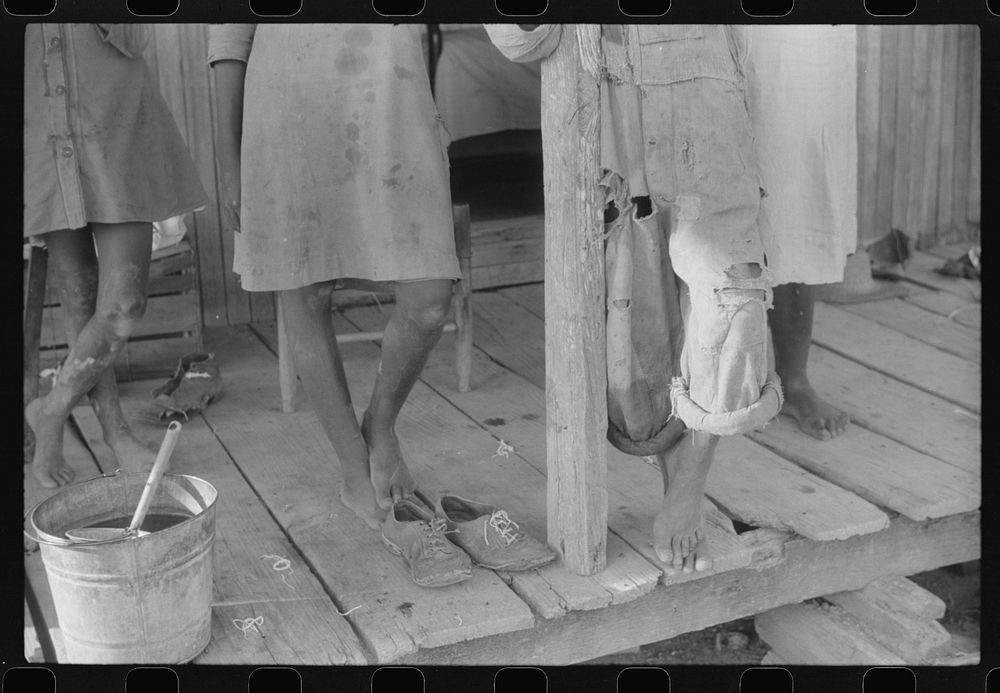 [Untitled photo, possibly related to: Feet of  children on a farm near Greensboro, Alabama]. Sourced from the Library of…