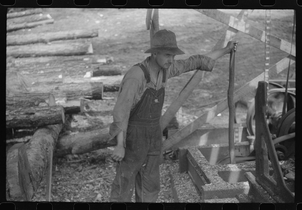 [Untitled photo, possibly related to: Sawmill worker at a small works in southern Greene County, Georgia]. Sourced from the…