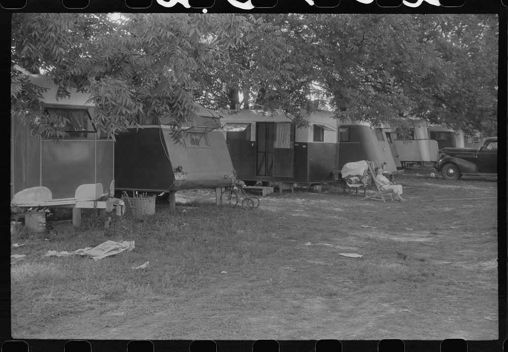 [Untitled photo, possibly related to: In a trailer camp in Childersburg, Alabama. Many workmen and their families living…