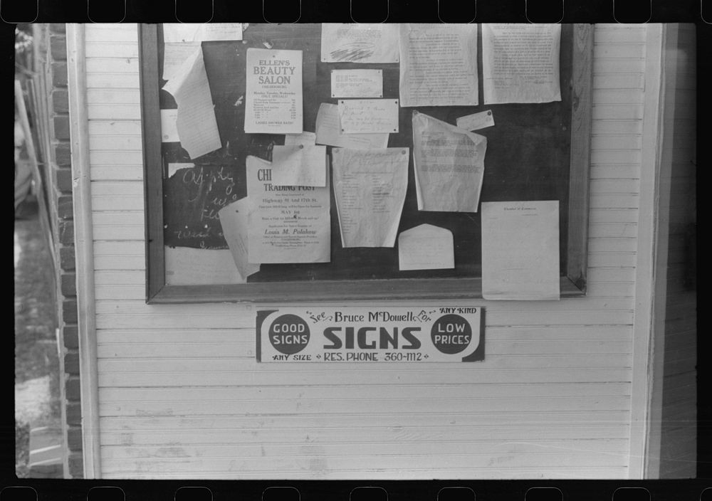 Signs on the post office bulletin board in Childersburg, Alabama. Sourced from the Library of Congress.