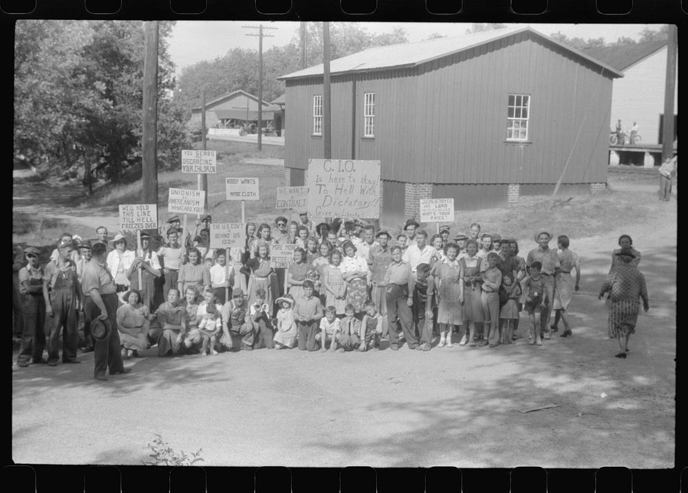 CIO pickets outside a mill in Greensboro pose for their picture. Greene County, Georgia. Sourced from the Library of…