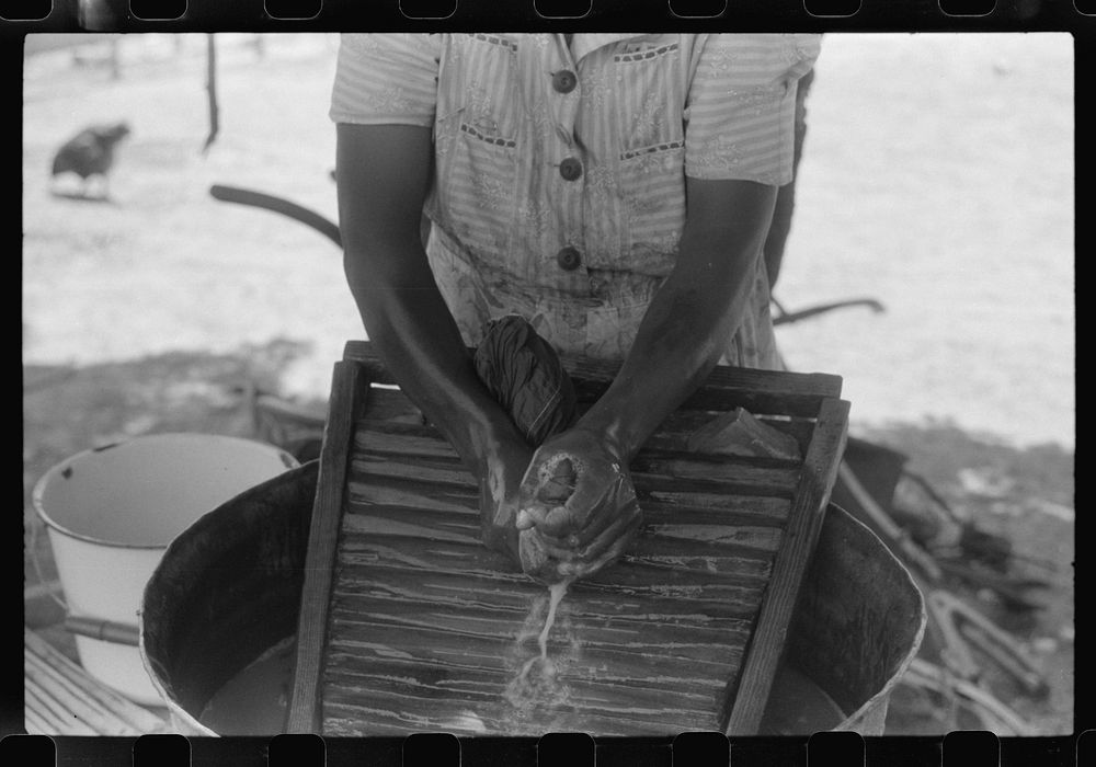 [Untitled photo, possibly related to: Tenant farmer's wife washing clothes, Greene County, Georgia]. Sourced from the…