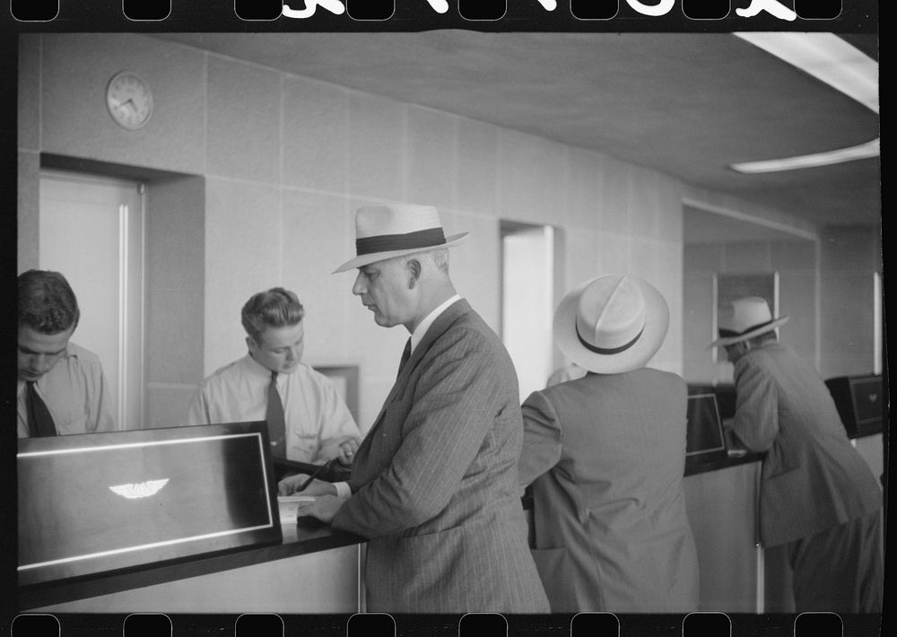 Washington, D.C. Passenger at the ticket office of the municipal airport. Sourced from the Library of Congress.