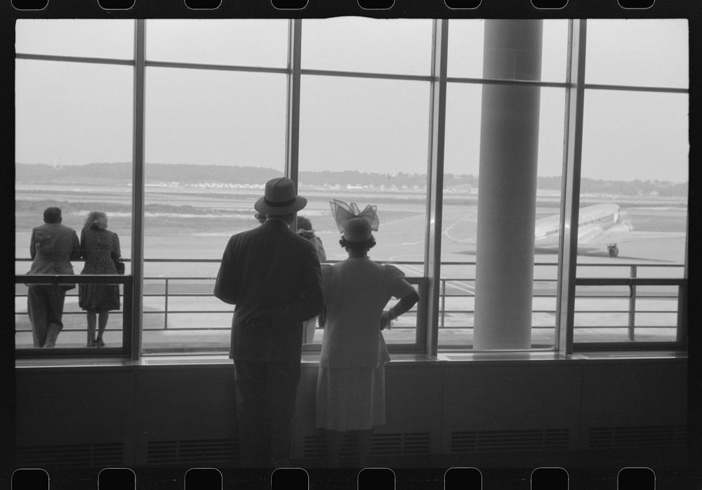 Washington, D.C. Watching the planes takeoff through the windows of the lobby of the municipal airport. Sourced from the…