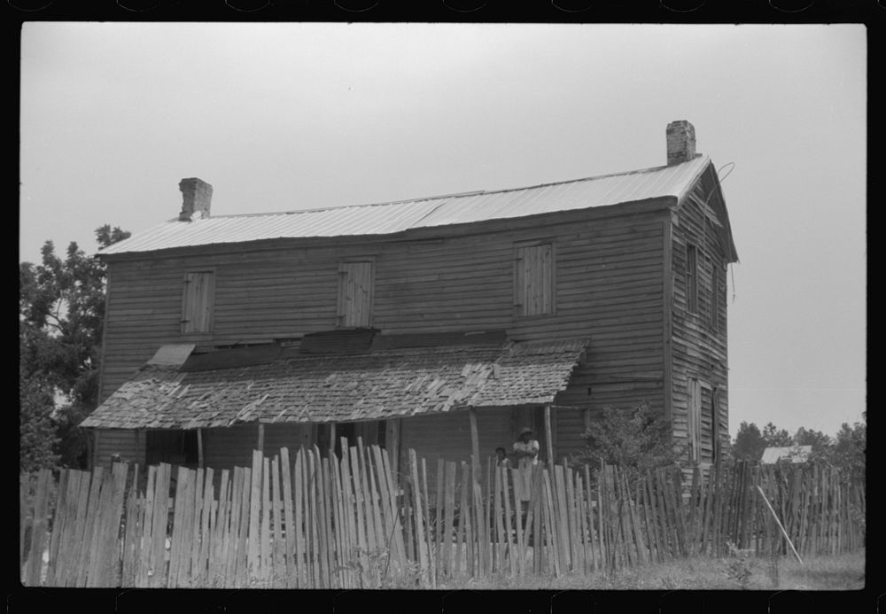Old house occupied by a  family, Penfield, Greene County, Georgia. Sourced from the Library of Congress.