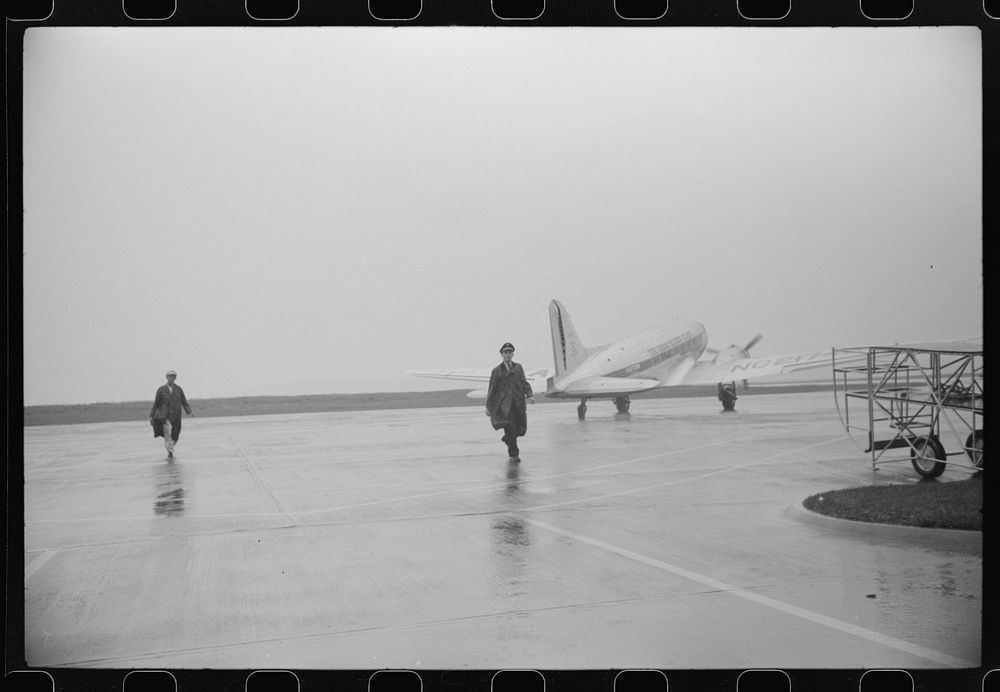 A plane taxiing off to the main runway at the municipal airport, in Washington, D.C.. Sourced from the Library of Congress.