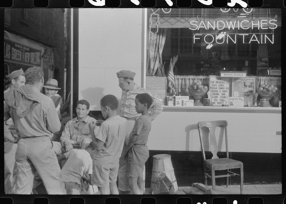 [Untitled photo, possibly related to: Soldiers getting their shoes shined in Fredericksburg, Virginia]. Sourced from the…