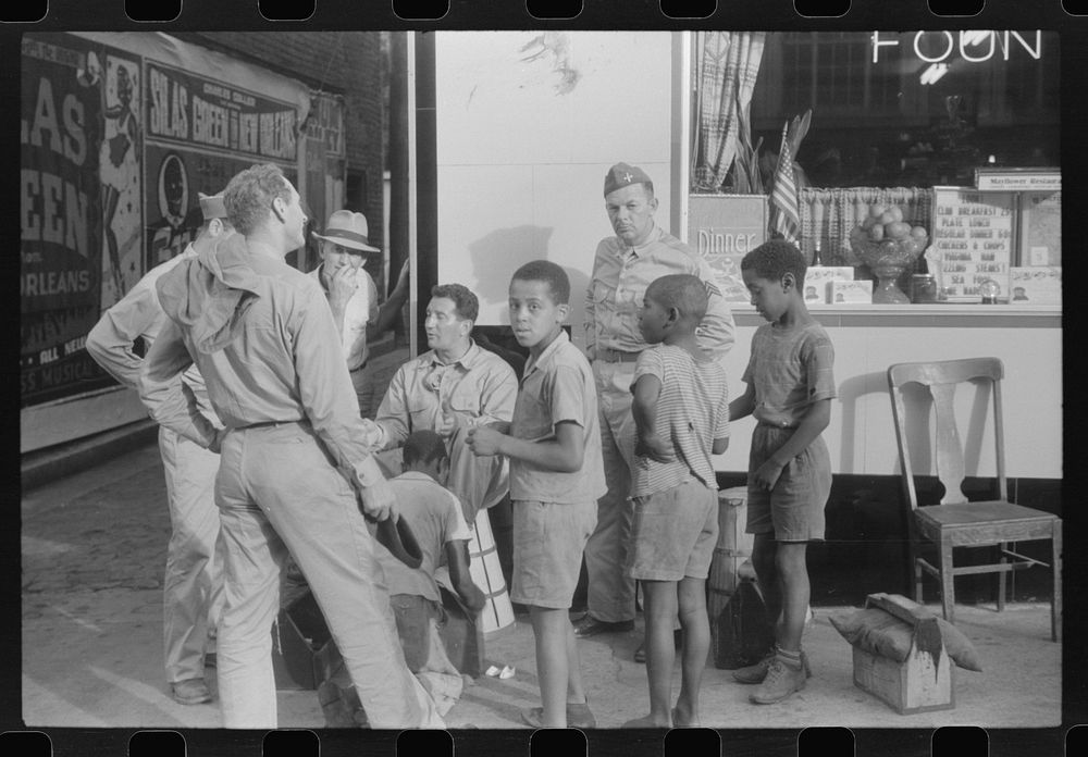 [Untitled photo, possibly related to: Soldiers getting their shoes shined in Fredericksburg, Virginia]. Sourced from the…