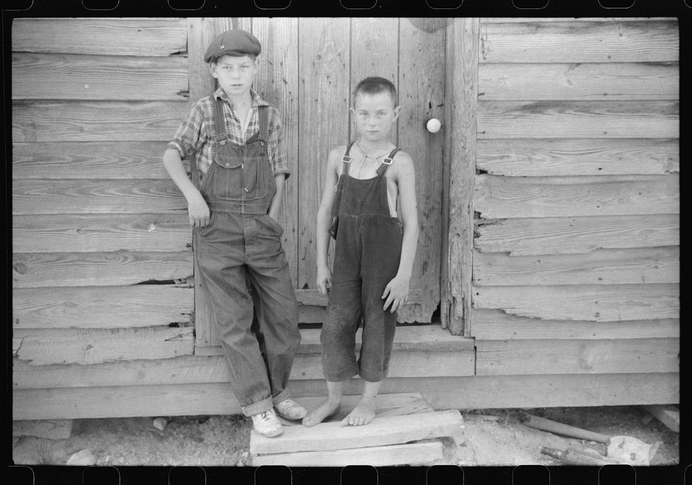 [Untitled photo, possibly related to: Children of William Corneal, farmer who must move out of the area being taken over by…