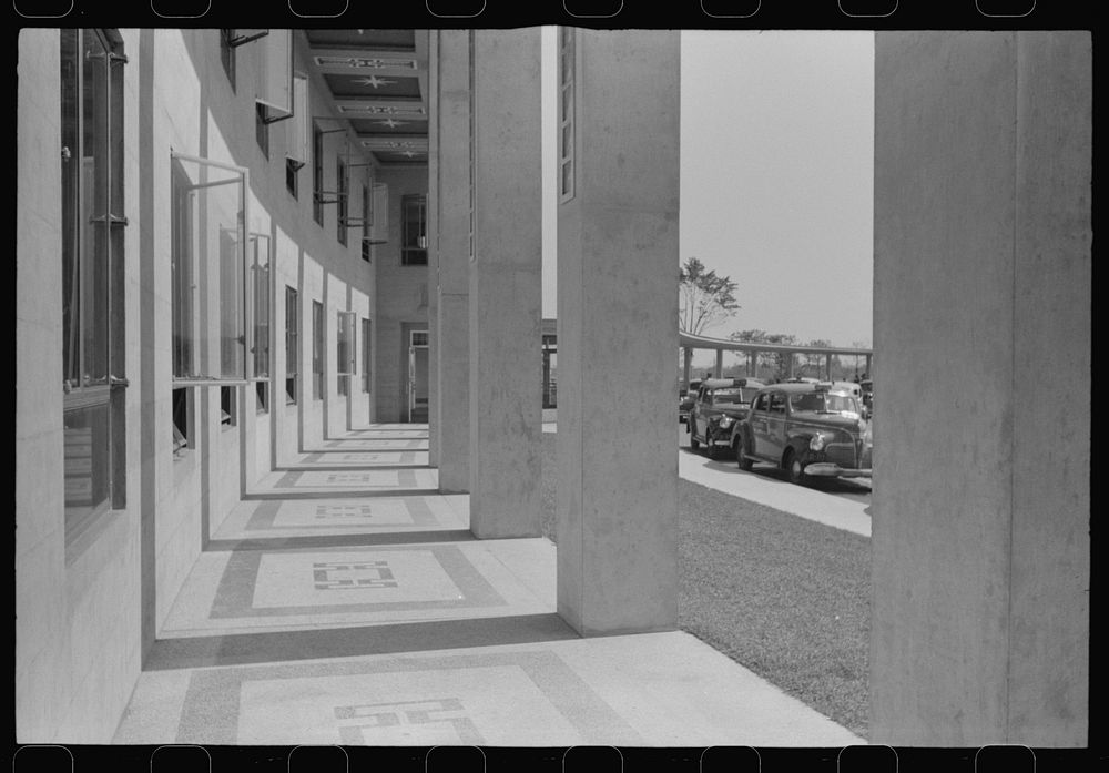 [Untitled photo, possibly related to: Through the colonnade at the municipal airport in Washington, D.C.]. Sourced from the…
