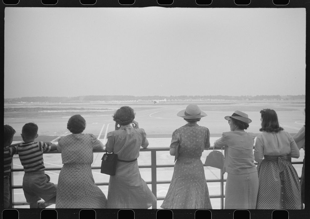 Visitors watching a plane take off at the municipal airport in Washington, D.C.. Sourced from the Library of Congress.