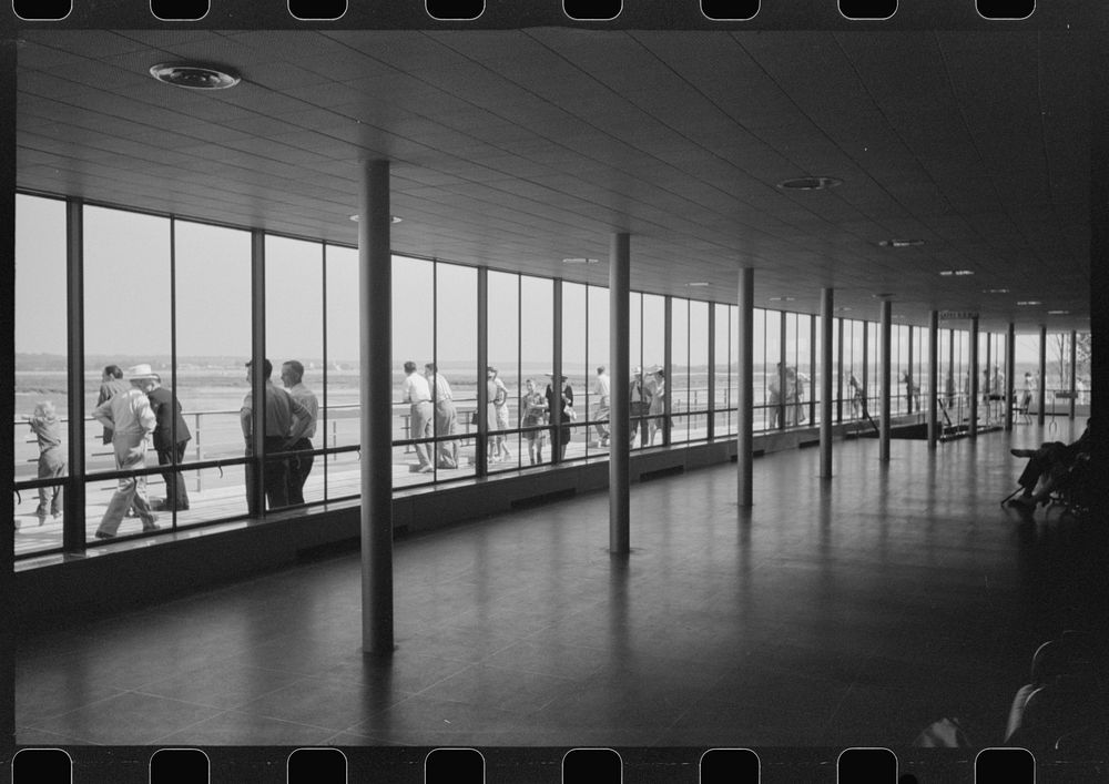 Visitors watching planes. Seen from waiting platform at the municipal airport in Washington, D.C.. Sourced from the Library…