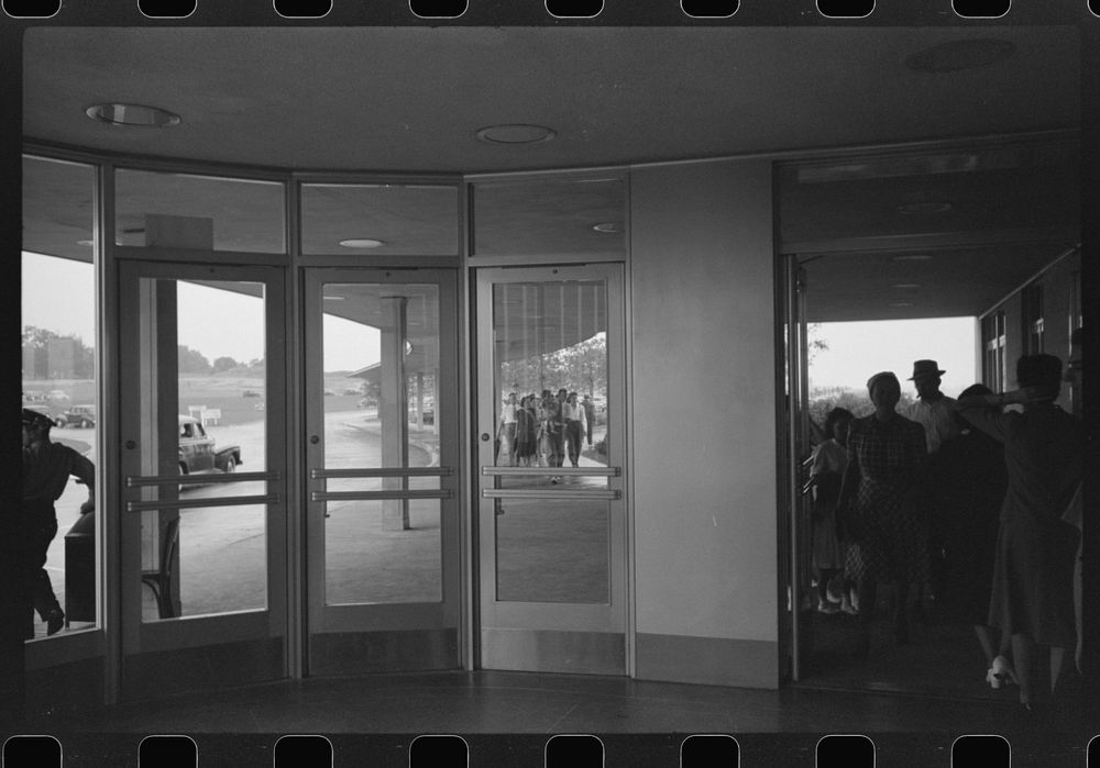 [Untitled photo, possibly related to: Looking out of one of the vestibules at the entrance to the municipal airport in…