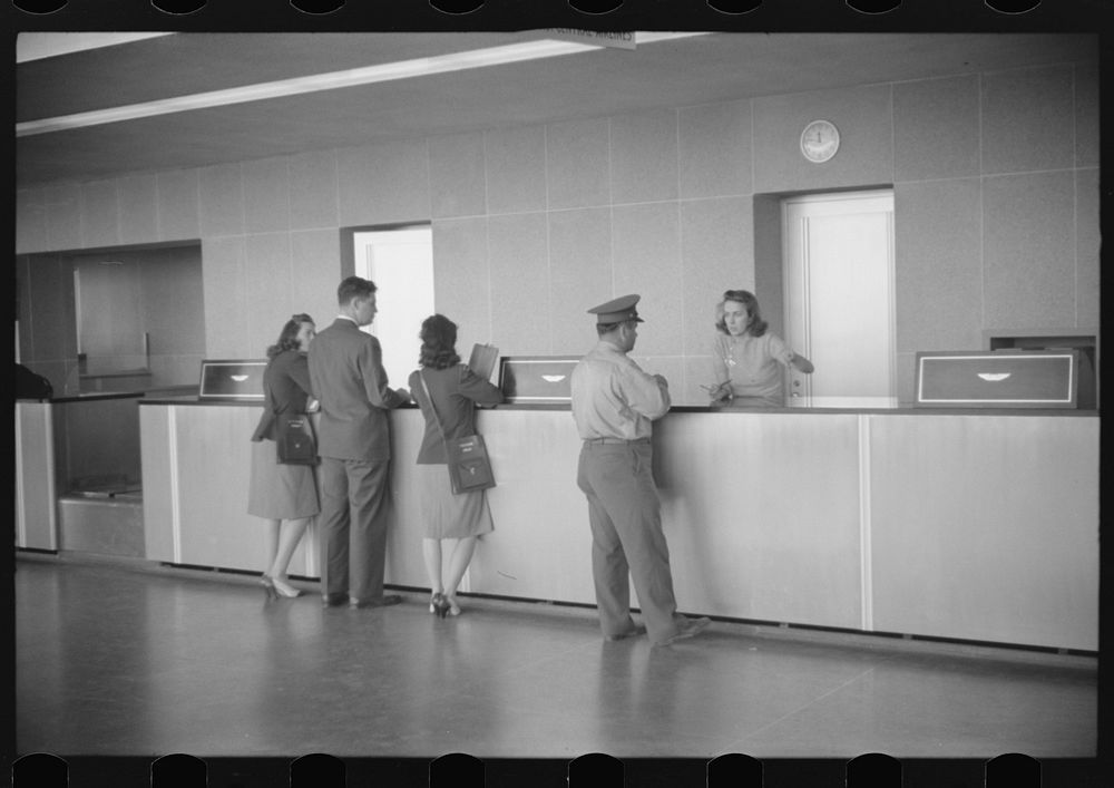 [Untitled photo, possibly related to: Ticket counter in main waiting room of the municipal airport in Washington, D.C.].…