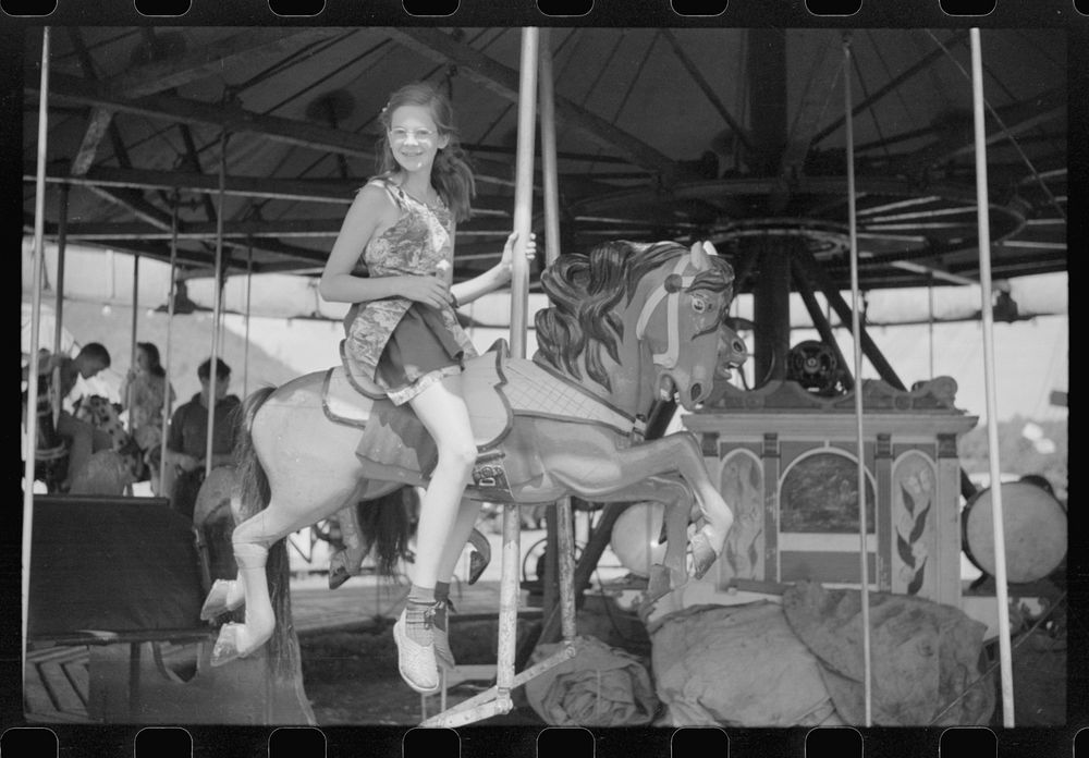 [Untitled photo, possibly related to: Amusements at a small American Legion fair near Bellows Falls, Vermont]. Sourced from…
