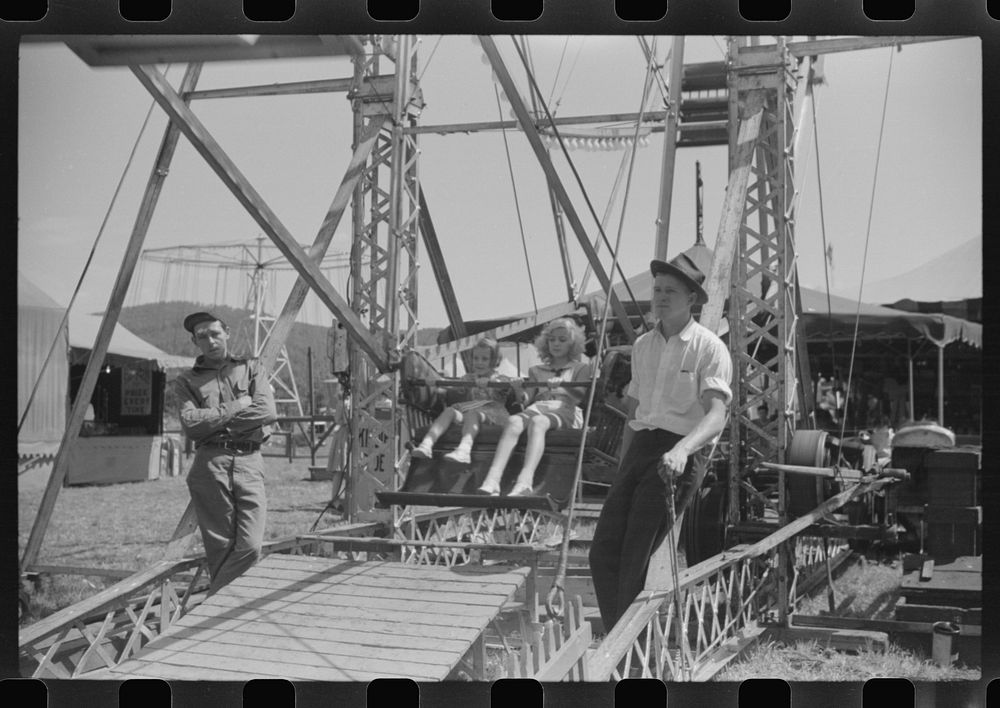 [Untitled photo, possibly related to: Getting on the ferris wheel at an American Legion carnival near Bellows Falls…