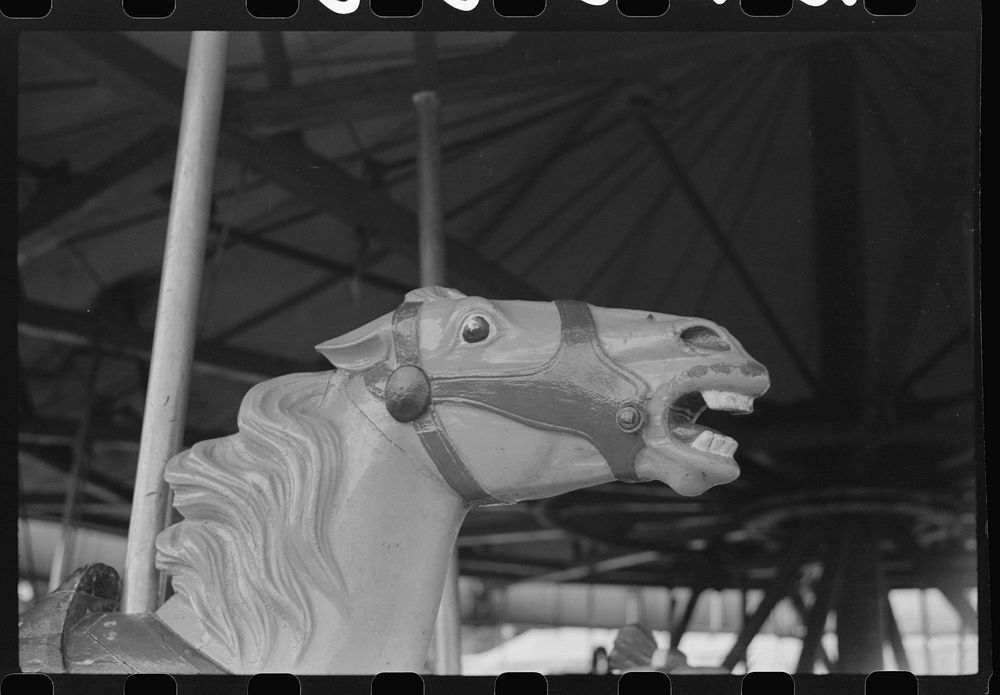 Merry-go-round at a small American Legion carnival near Bellows Falls, Vermont. Sourced from the Library of Congress.