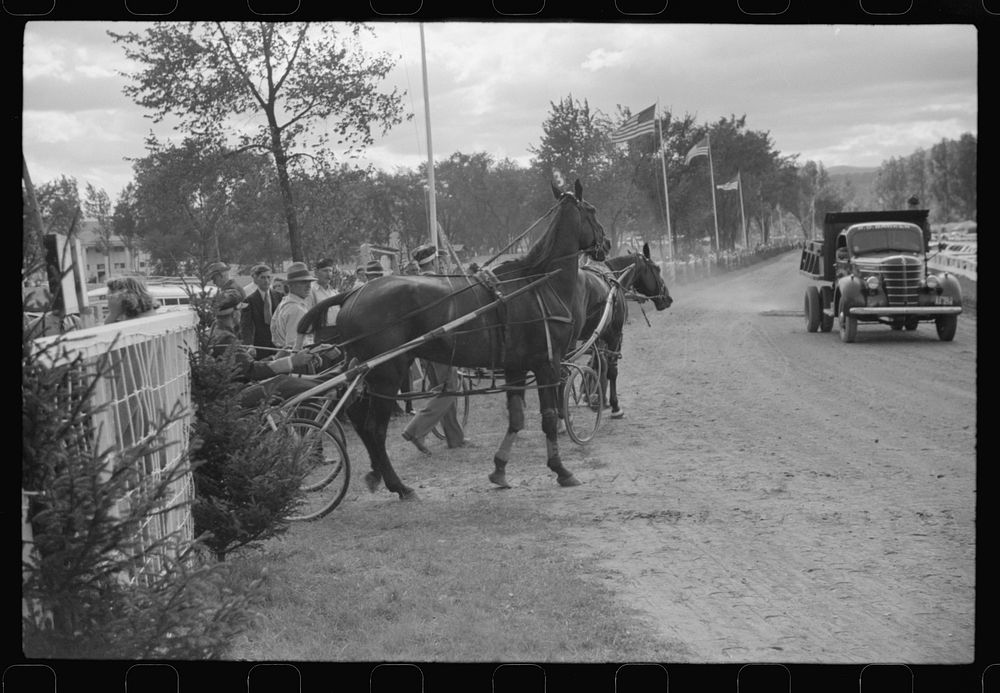 [Untitled photo, possibly related to: At the finish line of the sulky races at the Rutland Fair, Vermont]. Sourced from the…