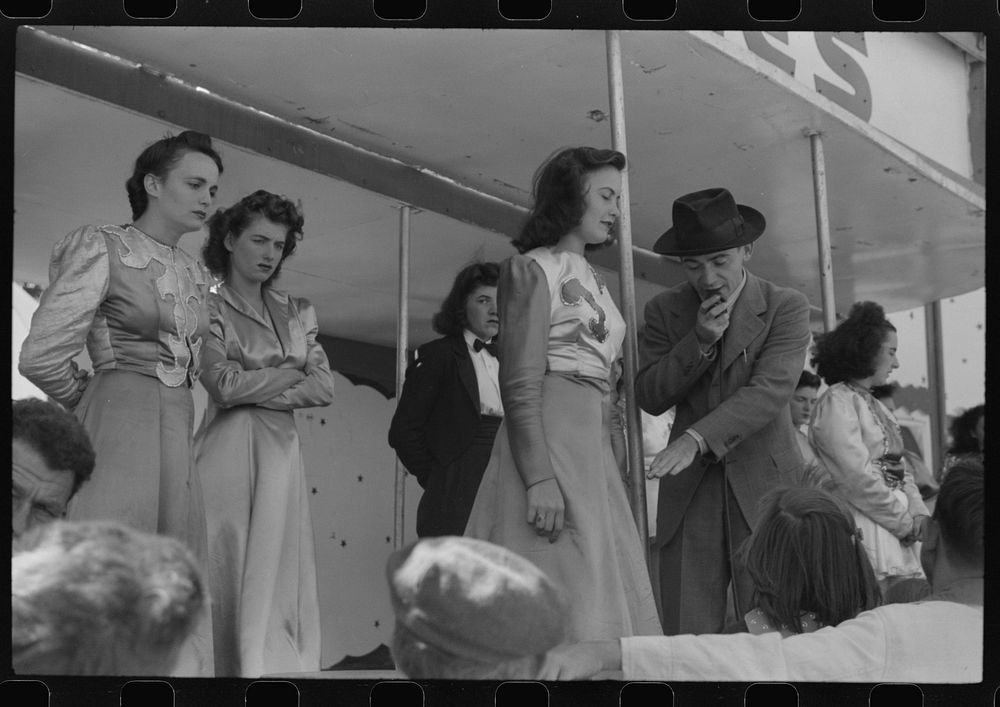 At a "girlie" show at the fair in Rutland, Vermont. Sourced from the Library of Congress.