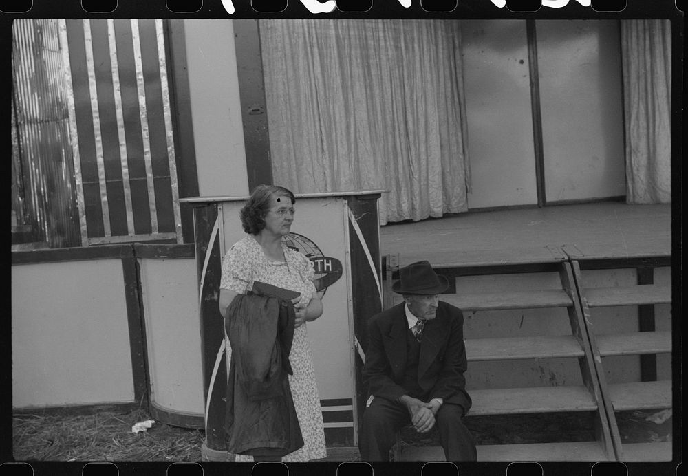 [Untitled photo, possibly related to: Tired visitors at the Rutland Fair, Rutland, Vermont]. Sourced from the Library of…