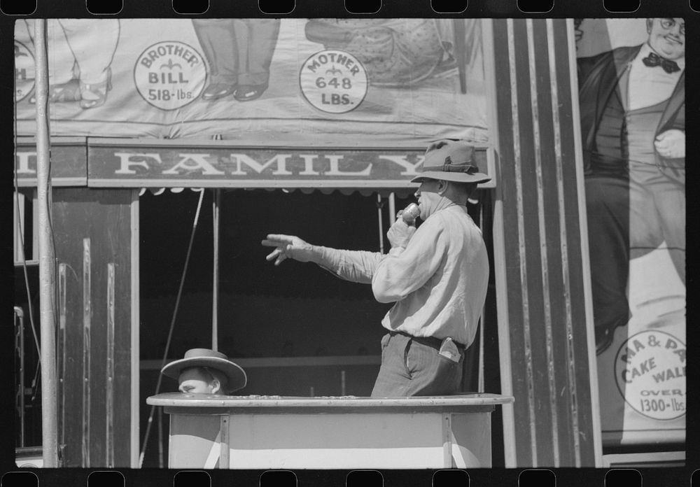 [Untitled photo, possibly related to: A sideshow at the Rutland Fair, Rutland, Vermont]. Sourced from the Library of…