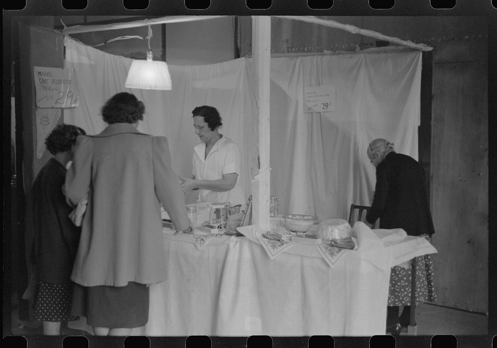 [Untitled photo, possibly related to: Demonstrating kitchen gadgets at the Champlain Valley Exposition, Essex Junction…