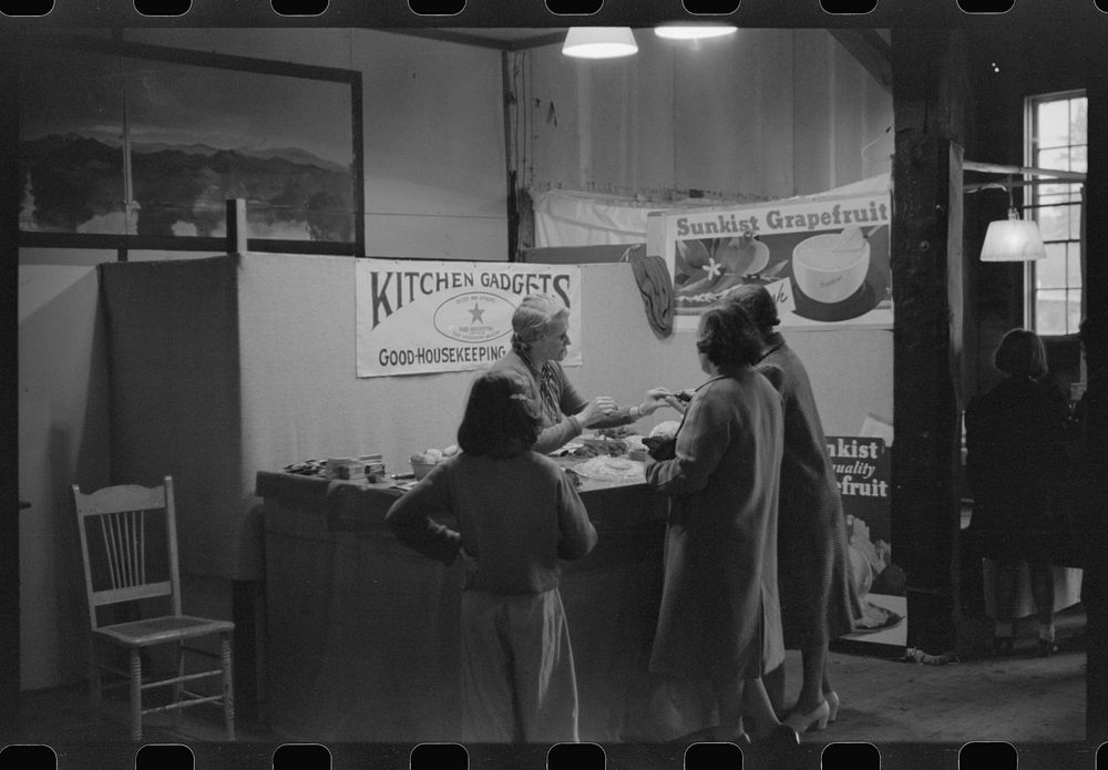 [Untitled photo, possibly related to: Demonstrating kitchen gadgets at the Champlain Valley Exposition, Essex Junction…