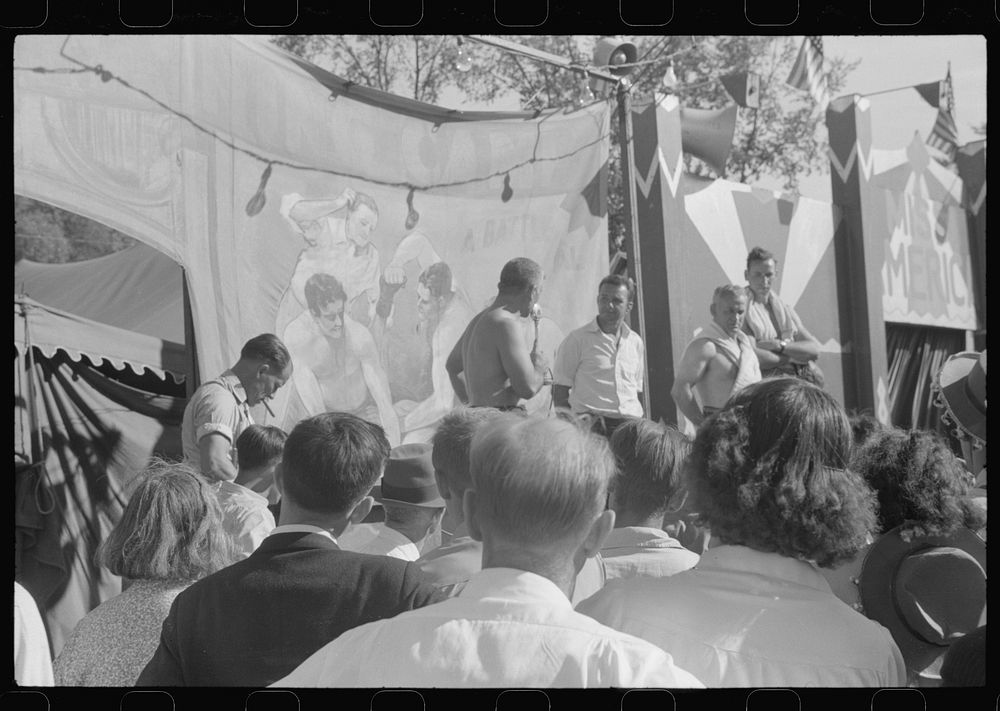 [Untitled photo, possibly related to: Wrestlers at the "World's Fair" in Tunbridge, Vermont]. Sourced from the Library of…