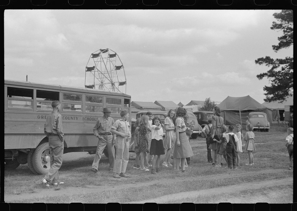[Untitled photo, possibly related to: Schoolchildren getting off the bus for free day at the fair. Greene County, Georgia].…