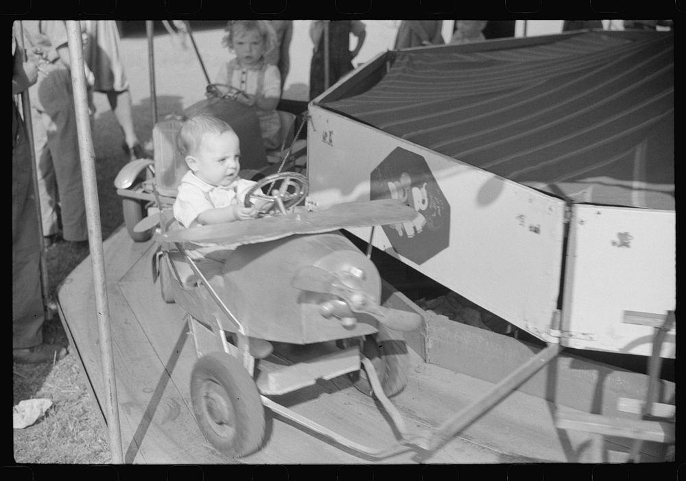[Untitled photo, possibly related to: At the county fair in Greene County, Greensboro, Georgia]. Sourced from the Library of…