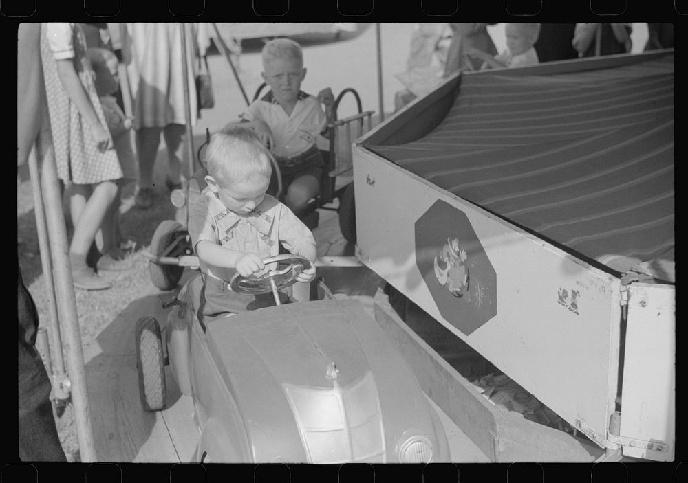 [Untitled photo, possibly related to: At the county fair in Greene County, Greensboro, Georgia]. Sourced from the Library of…