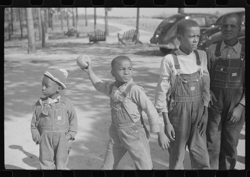 Greensboro (vicinity), Greene County, Georgia. Boyd Jones playing ball during the recess period at a  school. Sourced from…