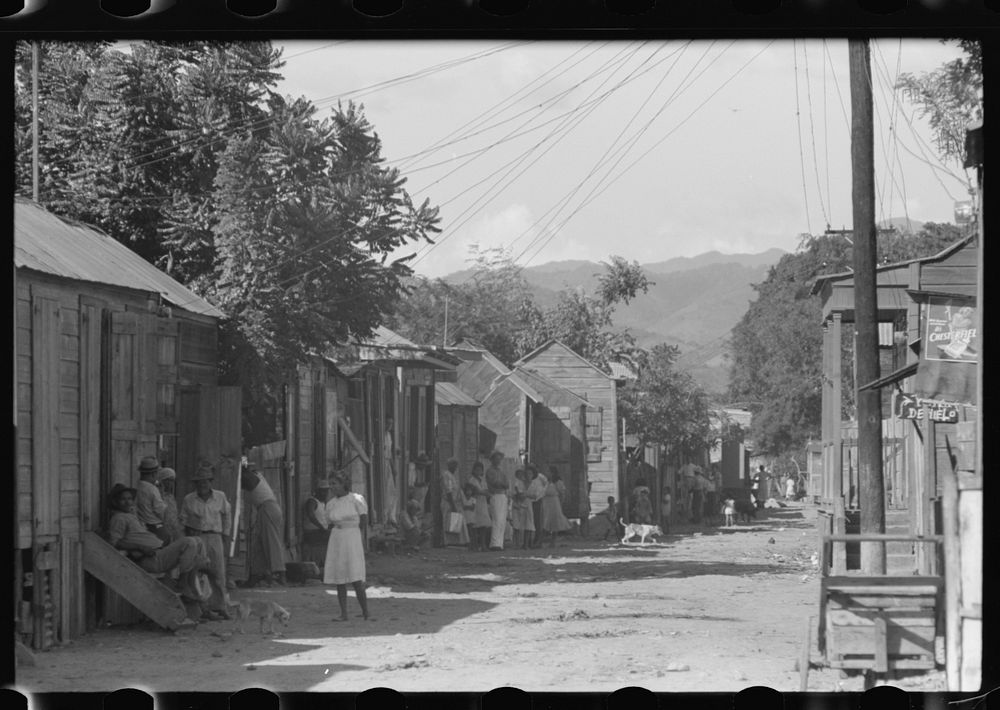 [Untitled photo, possibly related to: Street in slum area in Ponce, Puerto Rico. The land on which the houses stand rented…