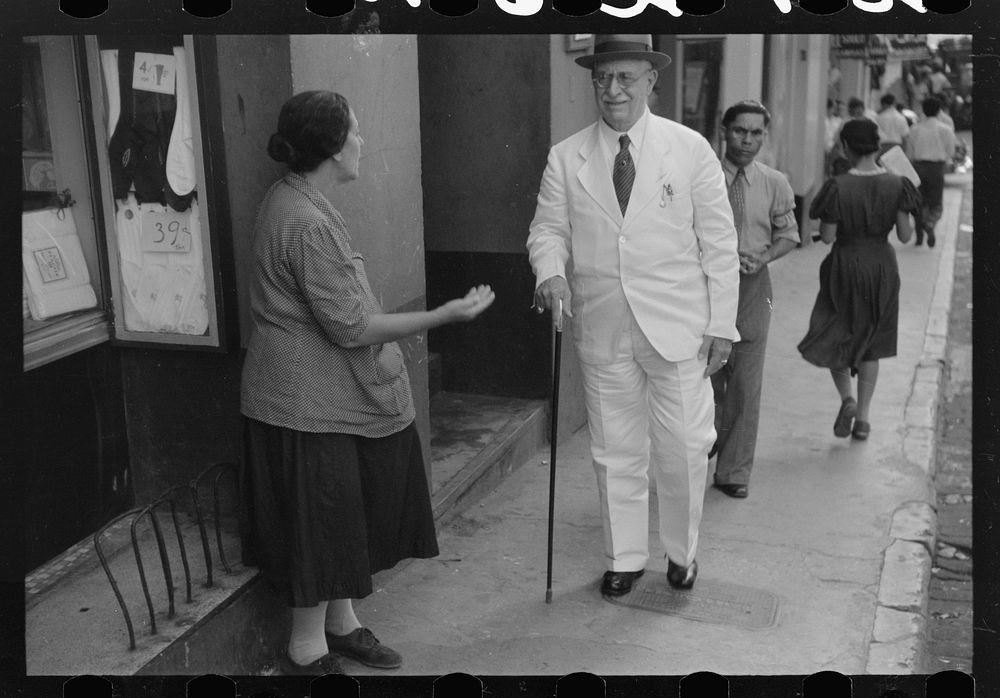 Begging in the streets of San Juan, Puerto Rico. Sourced from the Library of Congress.