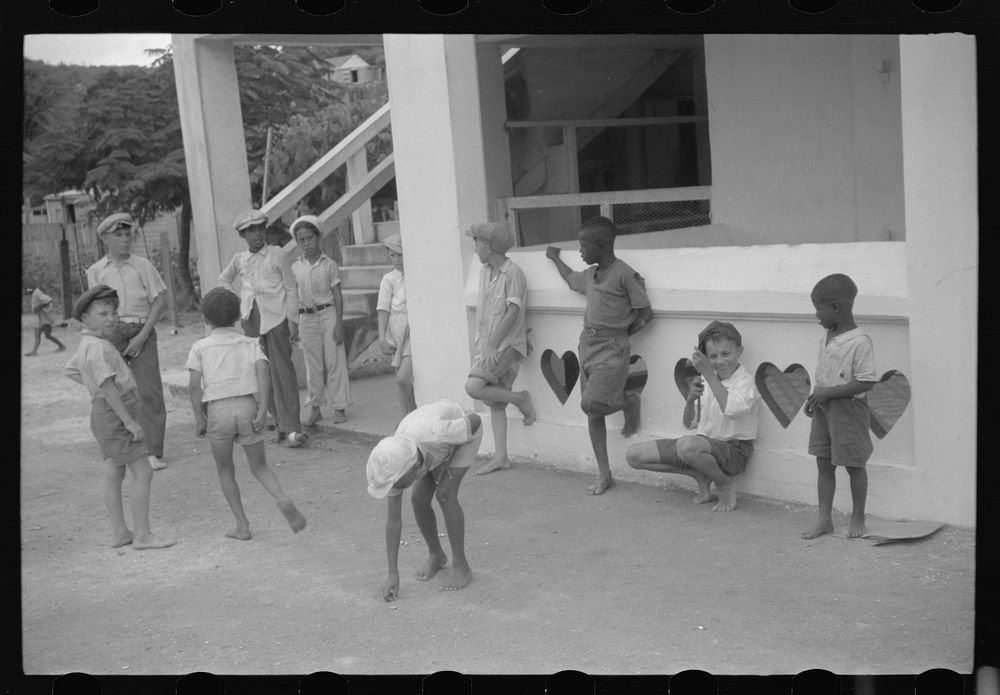 [Untitled photo, possibly related to: French Village, a small settlement on St. Thomas Island, Virgin Islands. Boys playing…