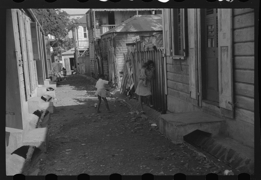 [Untitled photo, possibly related to: Charlotte Amalie, St. Thomas Island, Virgin Islands. Alleyway in one of the slum…