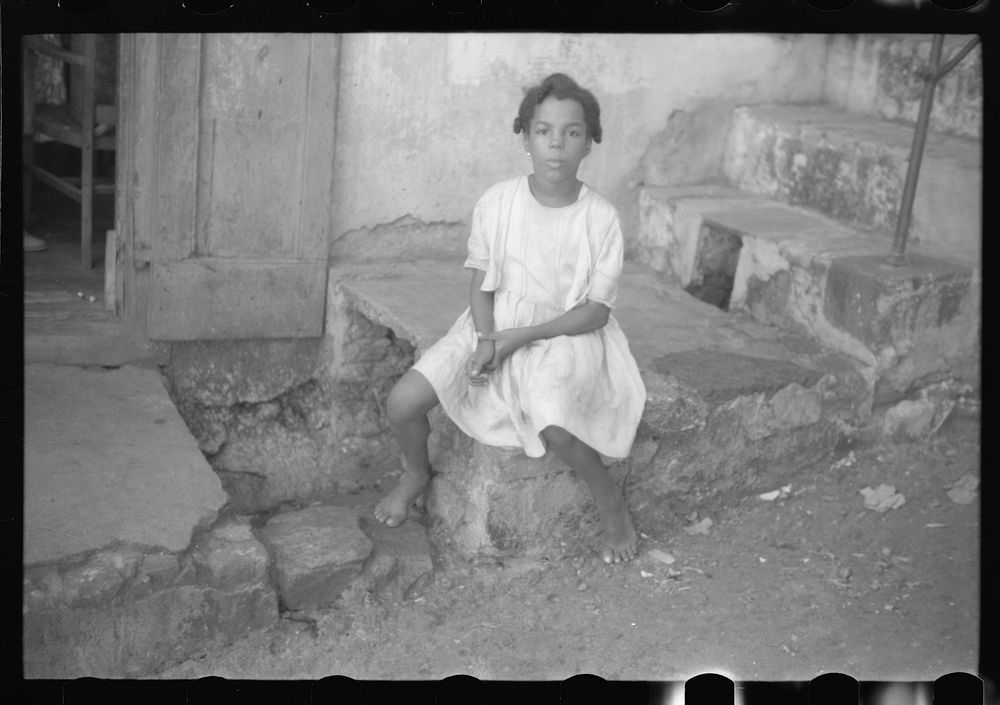 [Untitled photo, possibly related to: Children living in one of the substandard houses on a side street in Charlotte Amalie…
