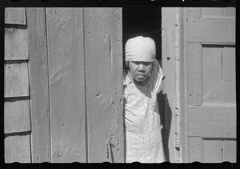 [Untitled photo, possibly related to: Charlotte Amalie, St. Thomas Island, Virgin Islands. Woman living in one of the…