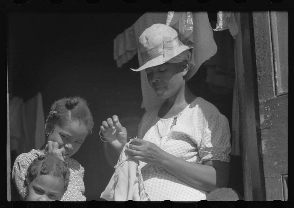 Charlotte Amalie, St. Thomas Island, Virgin Islands. Family living in a slum area. Sourced from the Library of Congress.