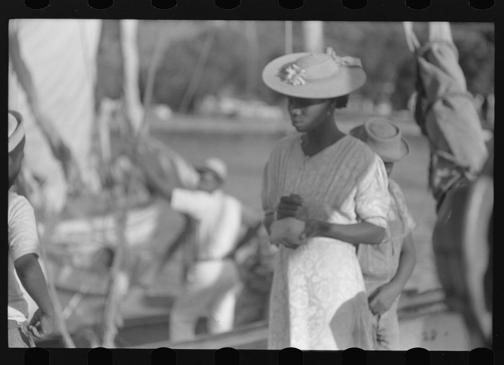 [Untitled photo, possibly related to: Charlotte Amalie, St. Thomas Island, Virgin Islands. Shoppers on Tortolla wharf].…