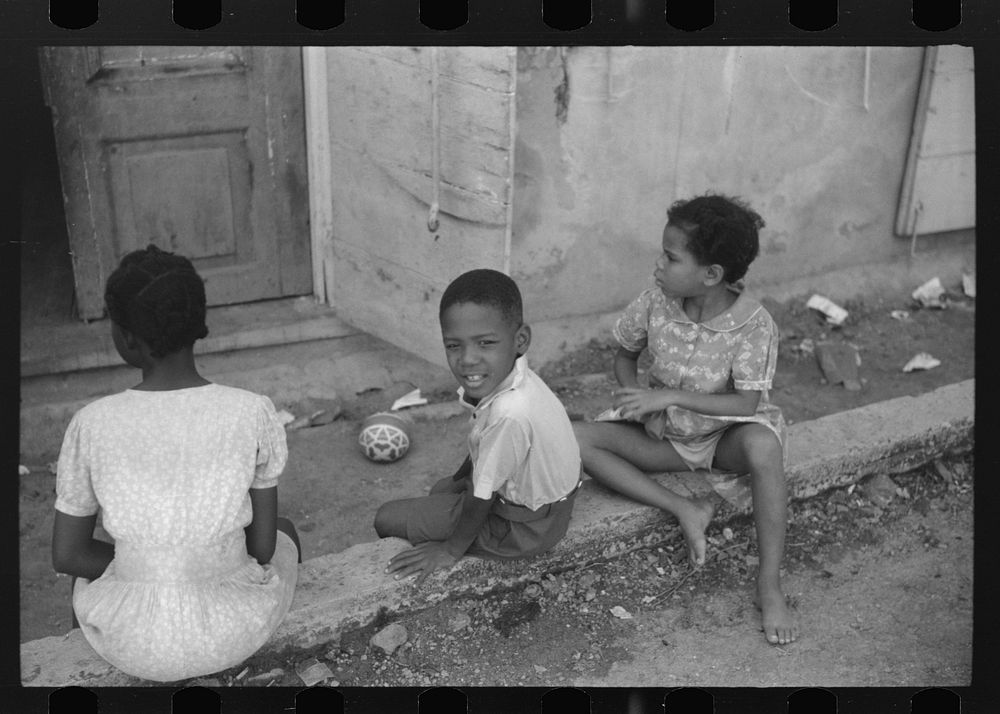 Charlotte Amalie, St. Thomas Island, Virgin Islands. Children playing in the street. Sourced from the Library of Congress.