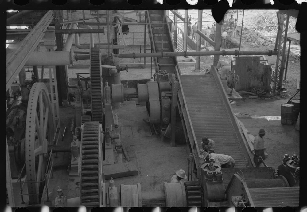 Getting machinery ready for the grinding season, Bethlehem Sugar Mill, St. Croix Island, Virgin Islands. Sourced from the…