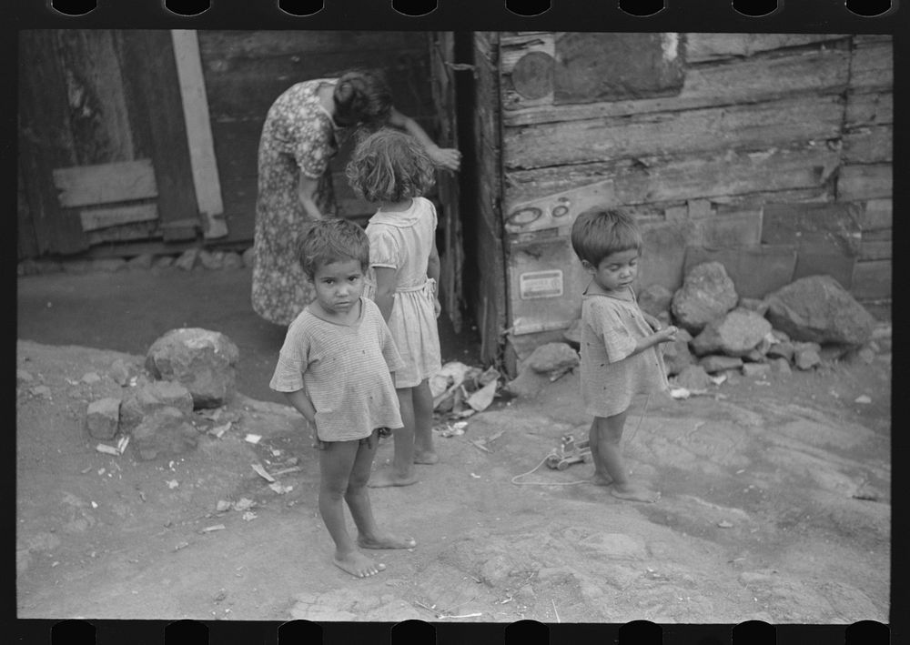 Children in the slum area, Yauco, Puerto Rico. Sourced from the Library of Congress.