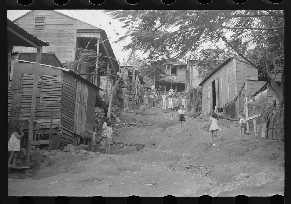 [Untitled photo, possibly related to: Yauco, Puerto Rico. Street in the slum area]. Sourced from the Library of Congress.