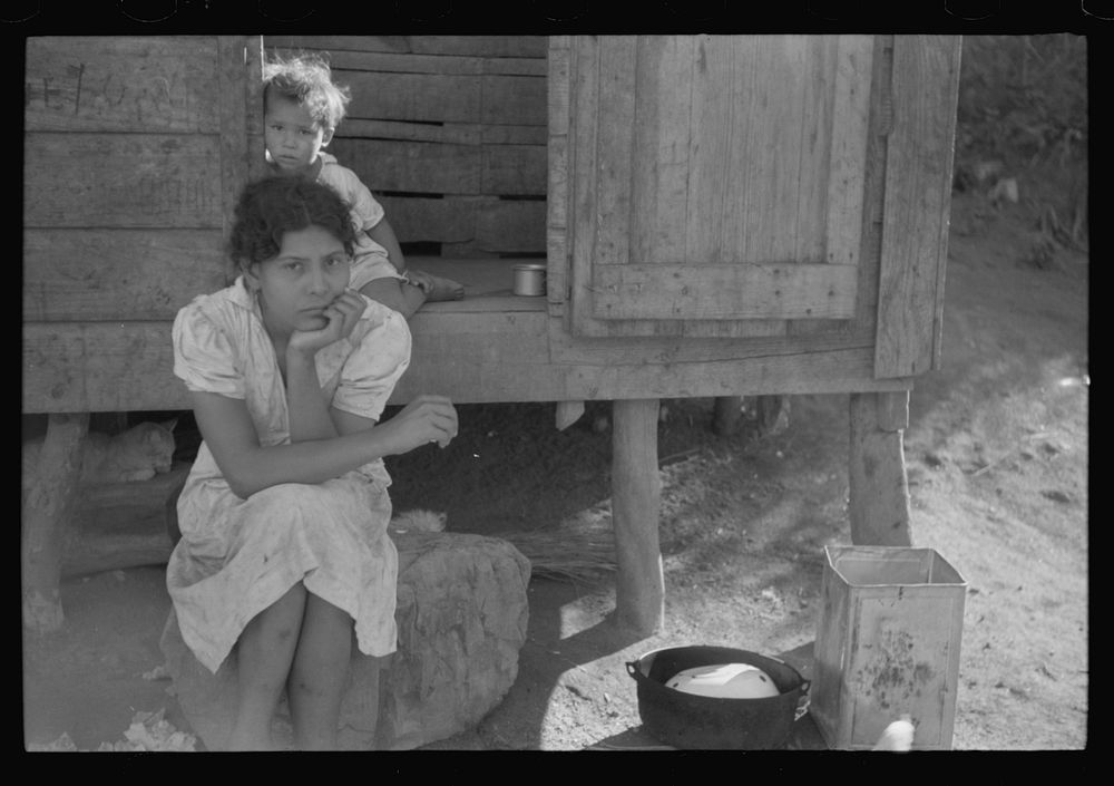 At the home of a farm laborer along the road in the hills near Yauco, Puerto Rico. Sourced from the Library of Congress.