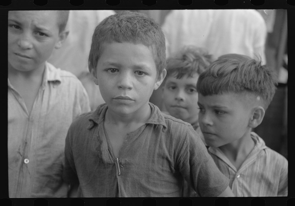Children who were begging for pennies in the market in Rio Piedras, Puerto Rico. Sourced from the Library of Congress.